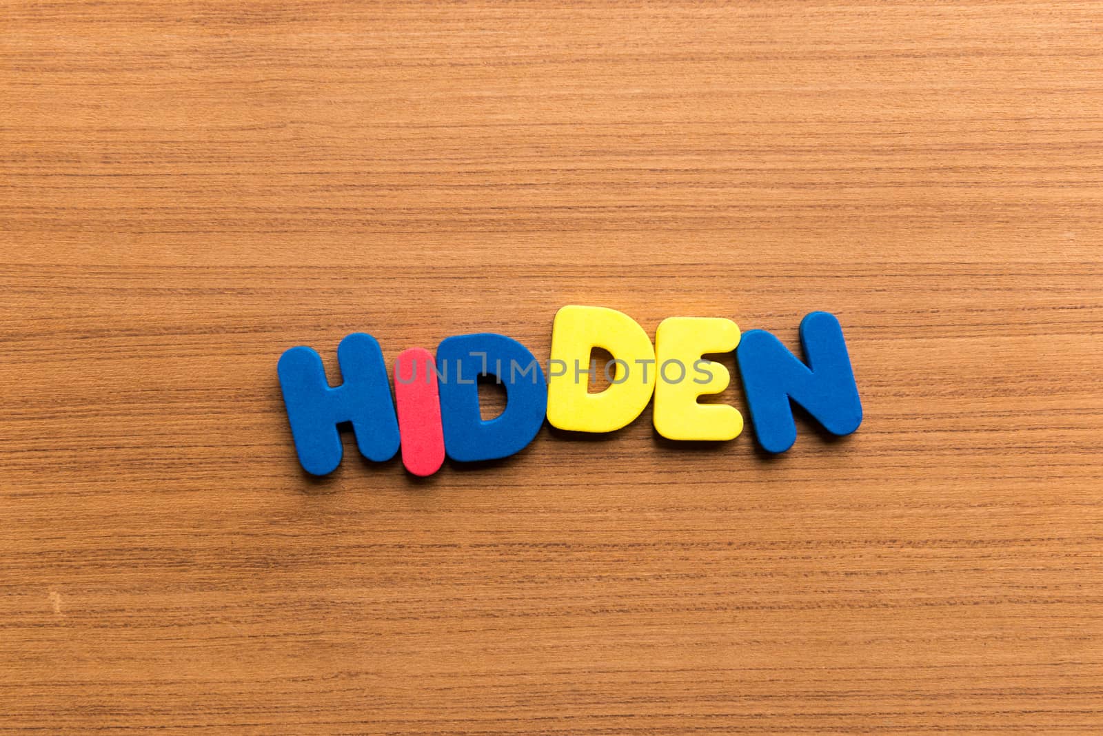 hidden colorful word on the wooden background