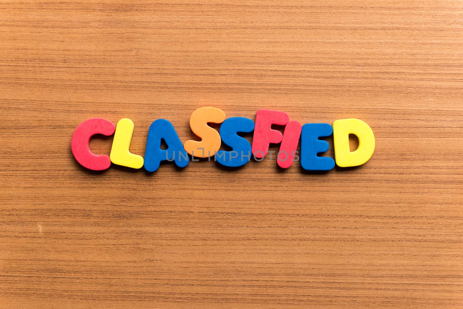 classified colorful word on the wooden background