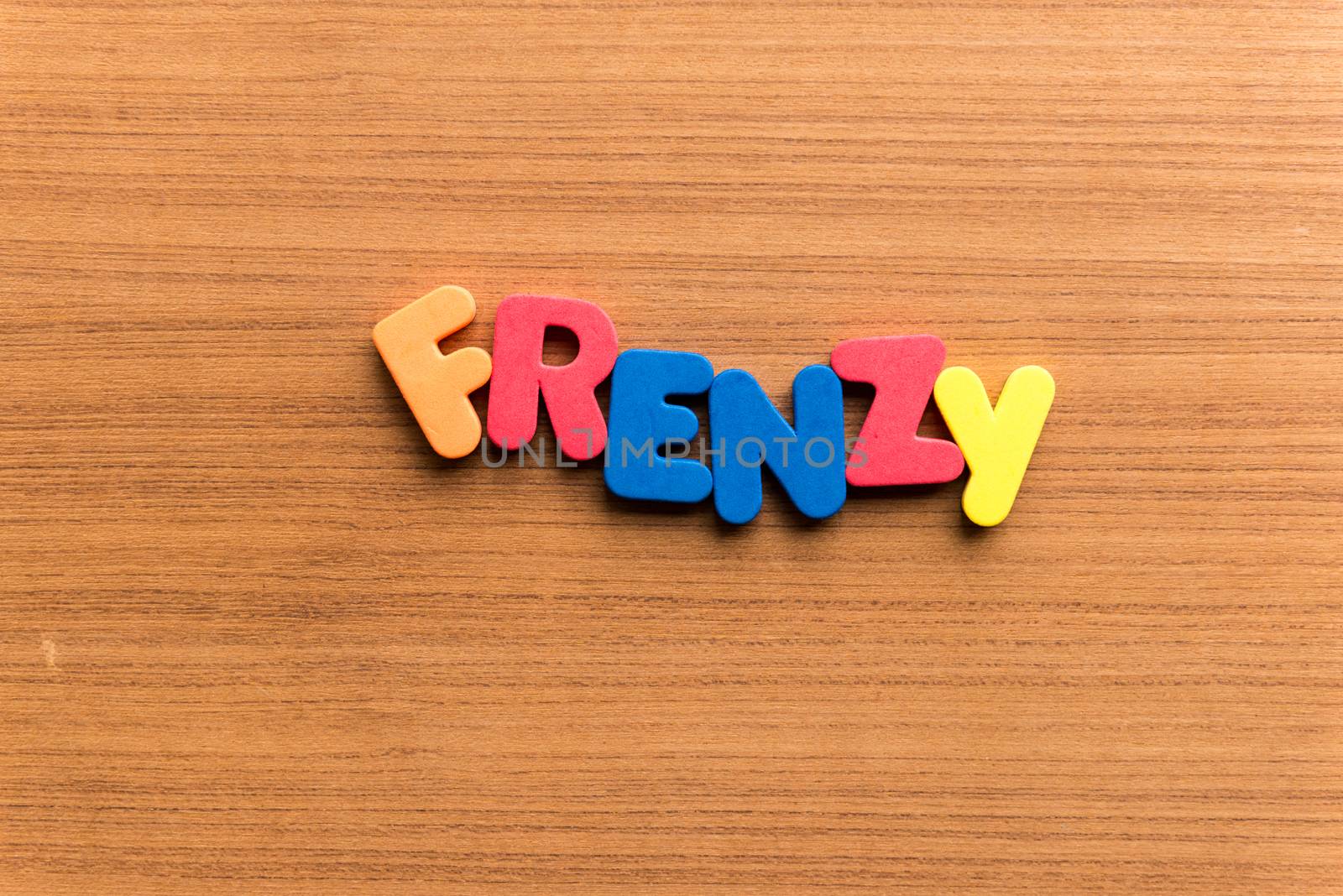 frenzy colorful word on the wooden background