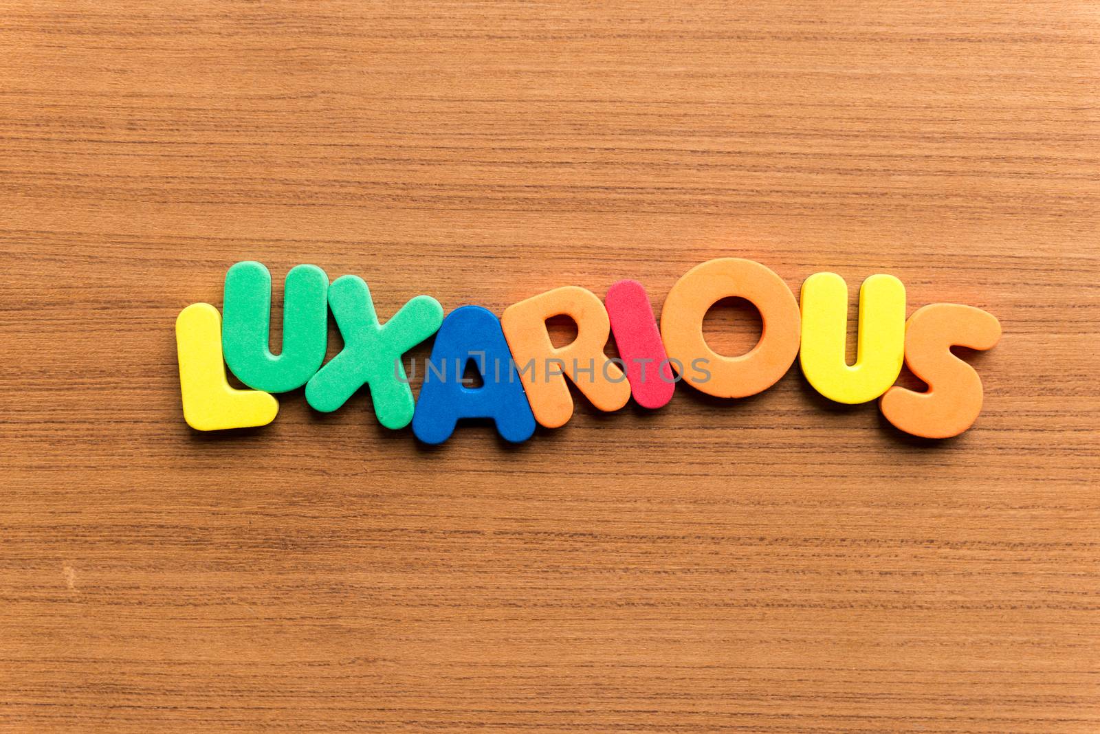 luxarious colorful word on the wooden background