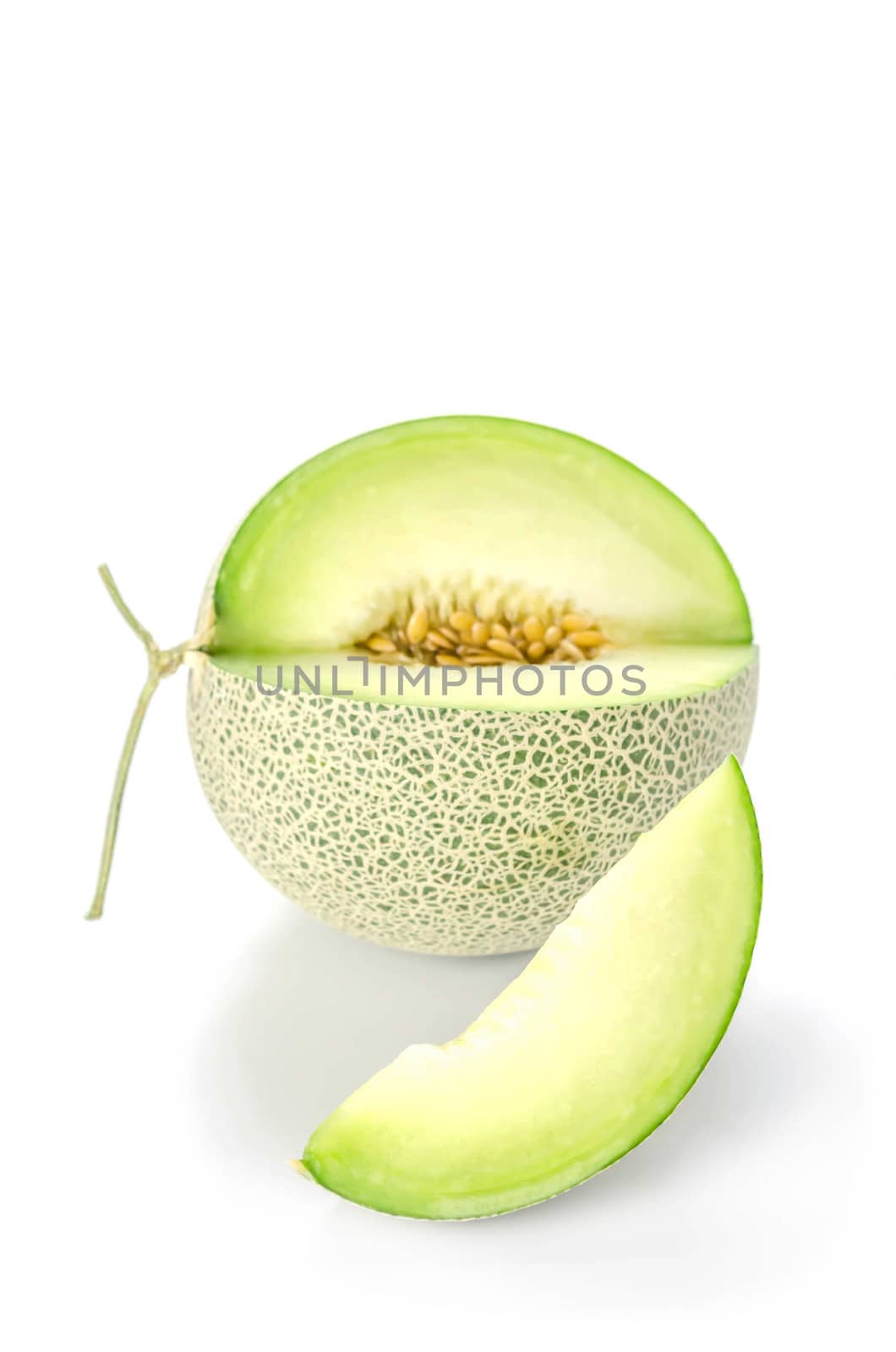 shopped green melon isolated on white background