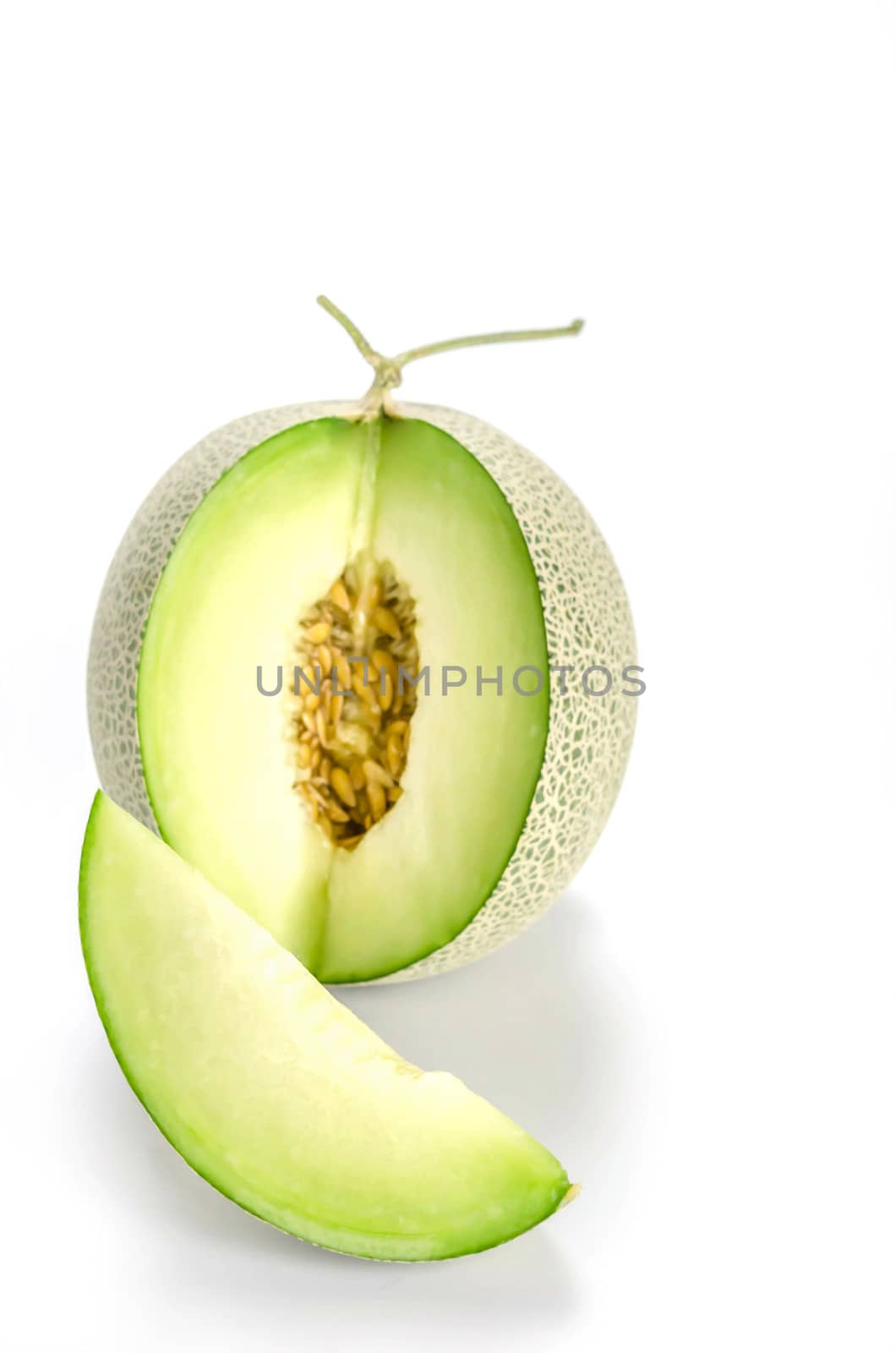 shopped green melon isolated on white background