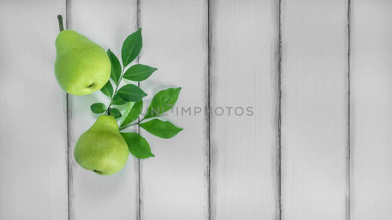 top view fresh pears on the wooden background, Free space for text