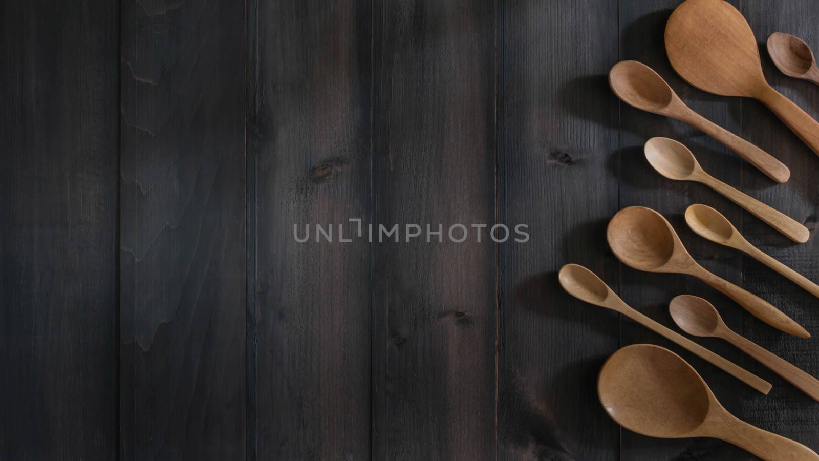 different wooden spoon on the table with copy space for text
