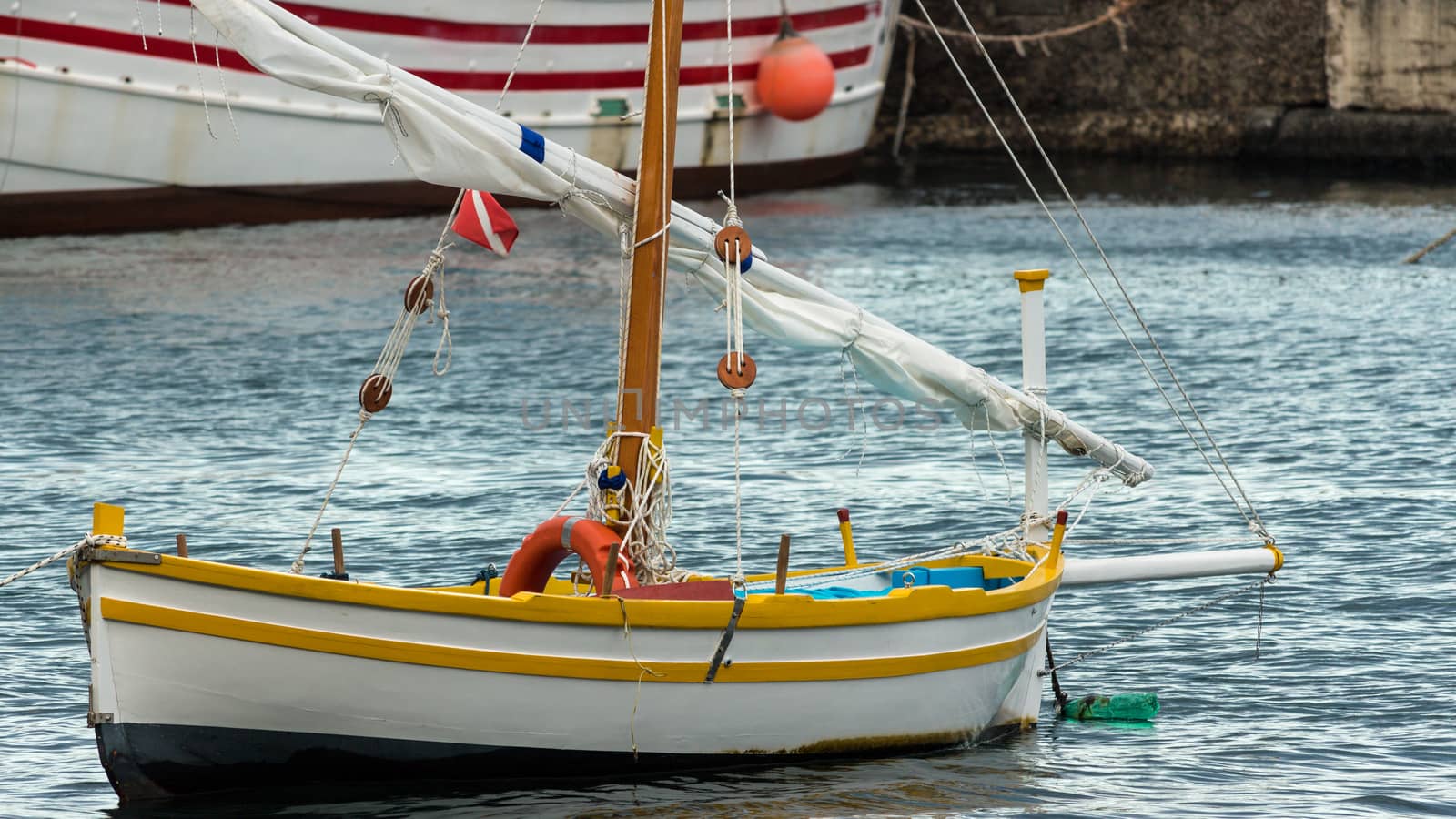 Sicily - Italy. The sailboat anchored in the harbor.