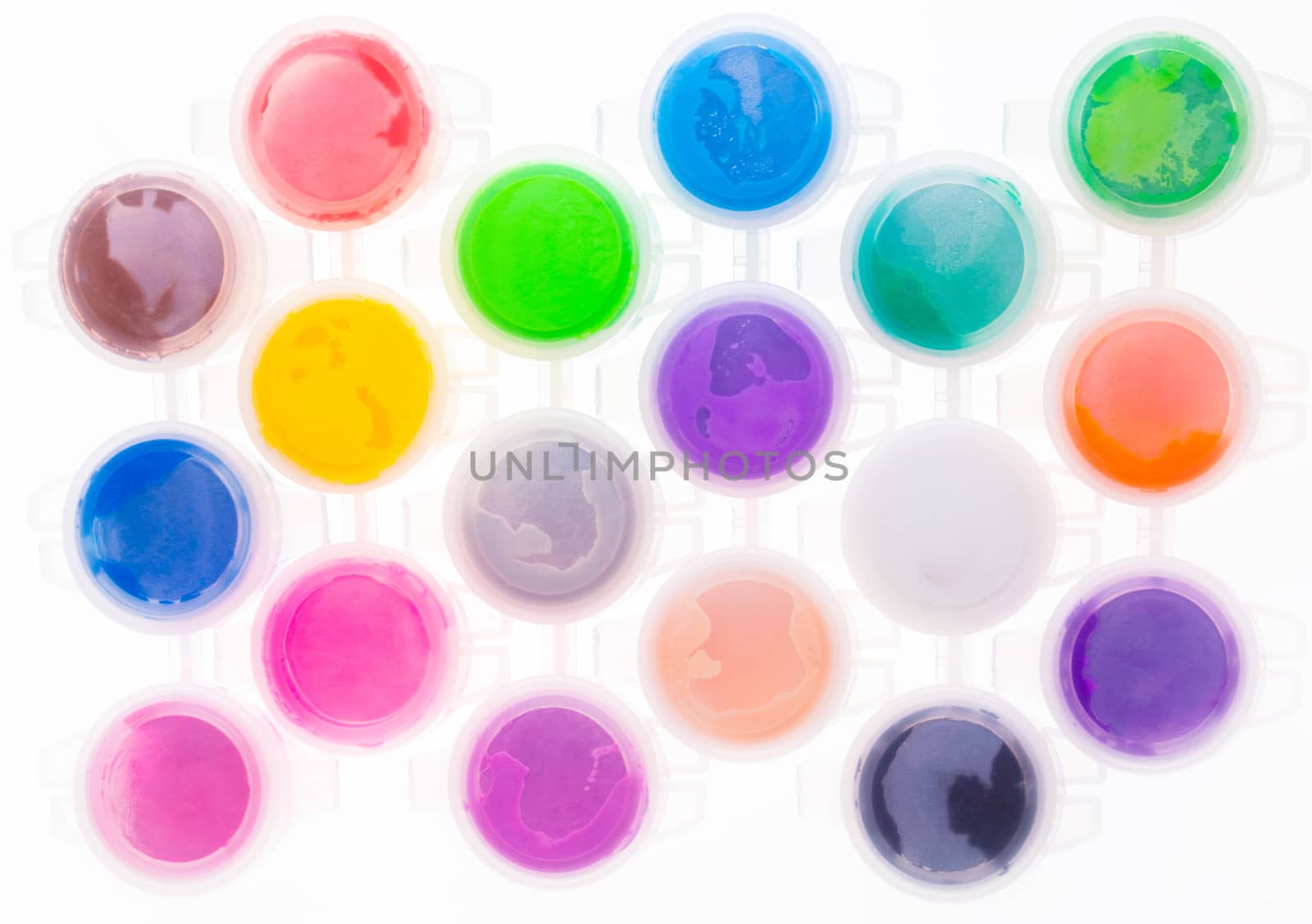set of multi-colored paint on a white background