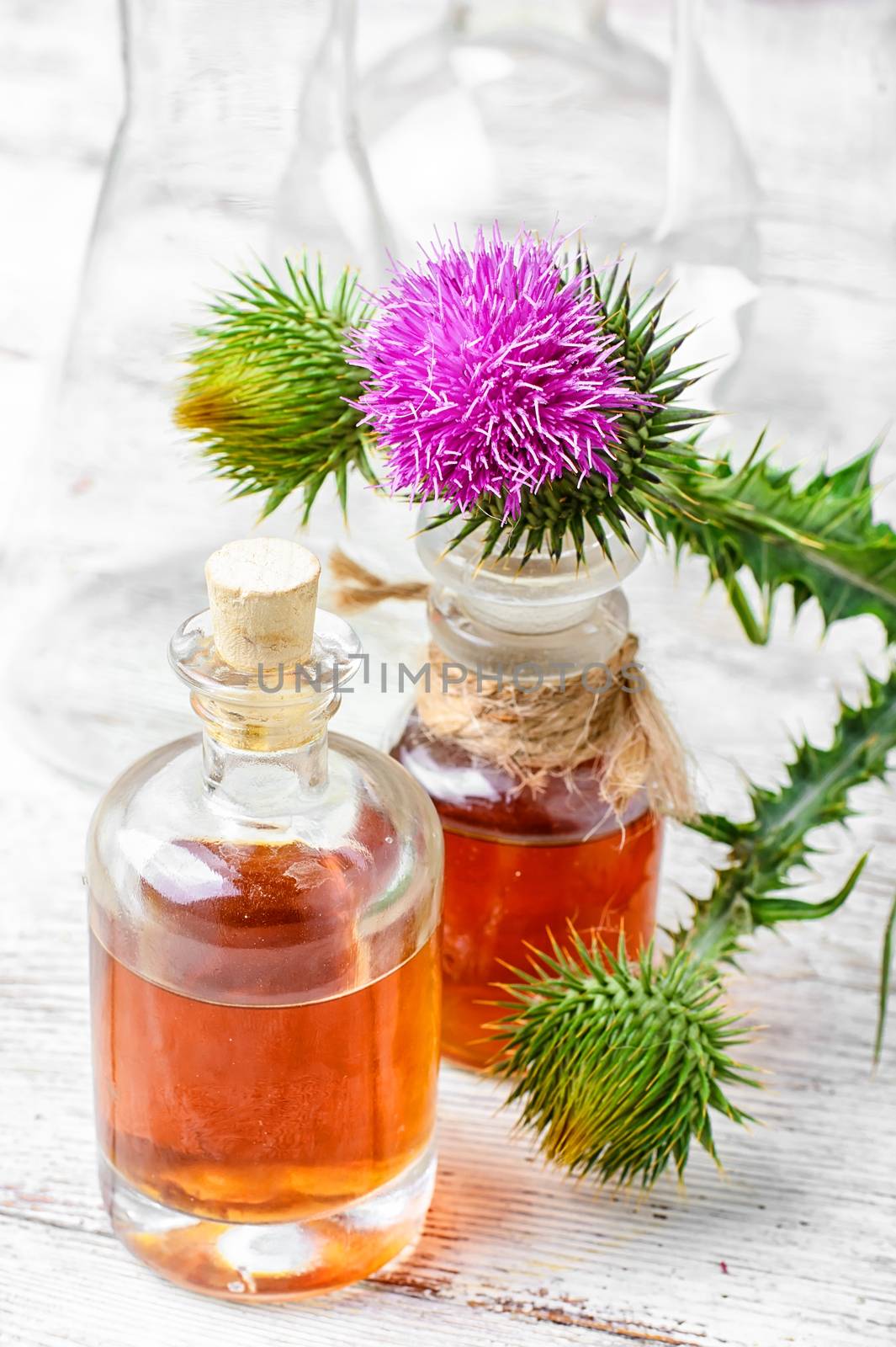 Glass vial with therapeutic drug of the flowering milk Thistle