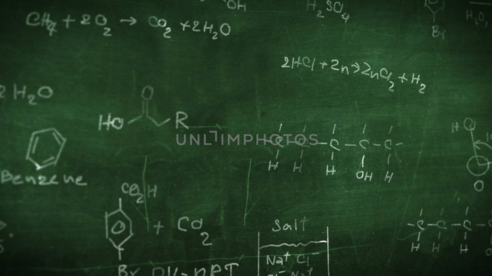 Organic chemical formulas on a green chalkboard
