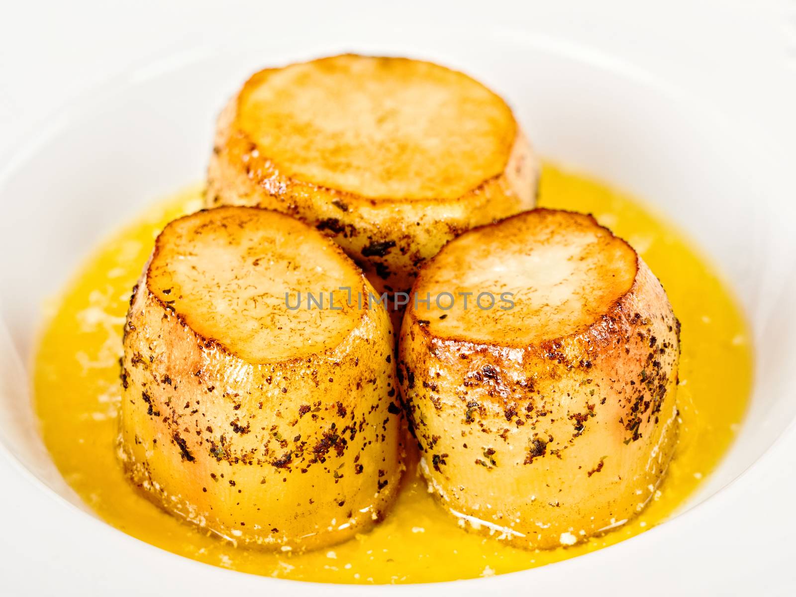 close up of golden fondant potato