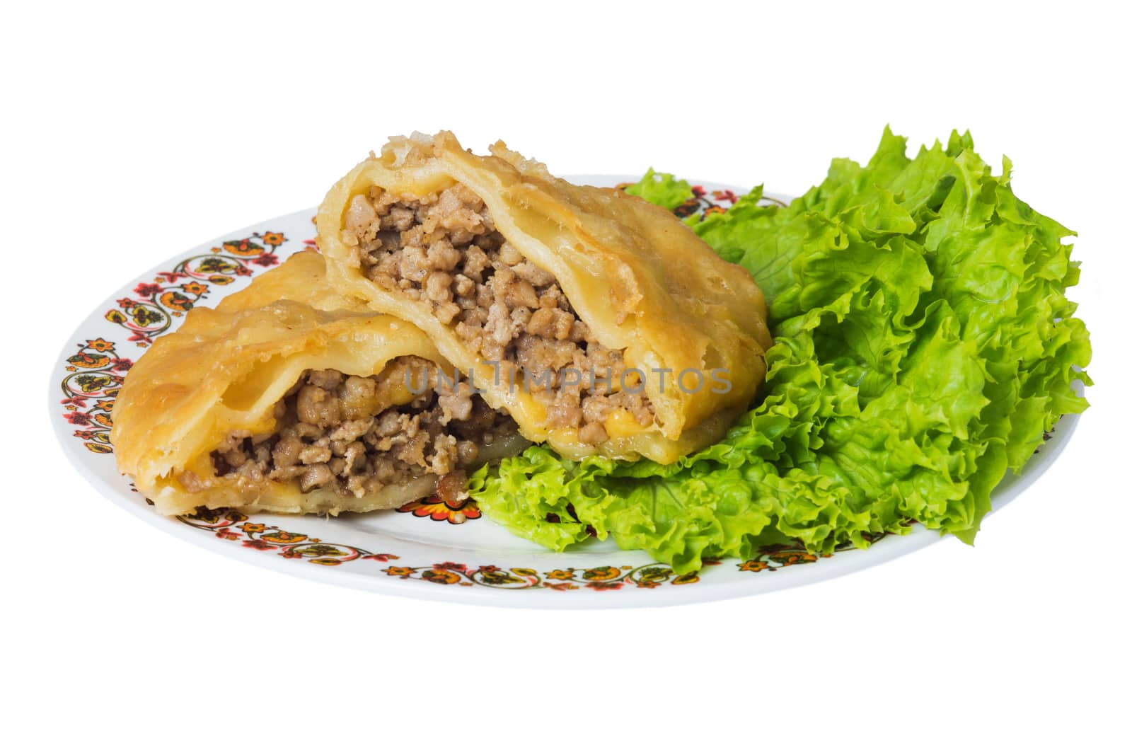 Caucasian pie stuffed with meat (cheburek) on plate, isolated