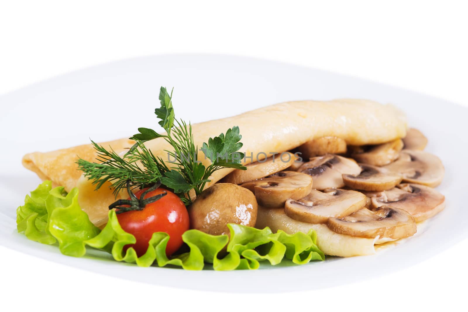 Pancakes with mushrooms on plate on a white background, isolated