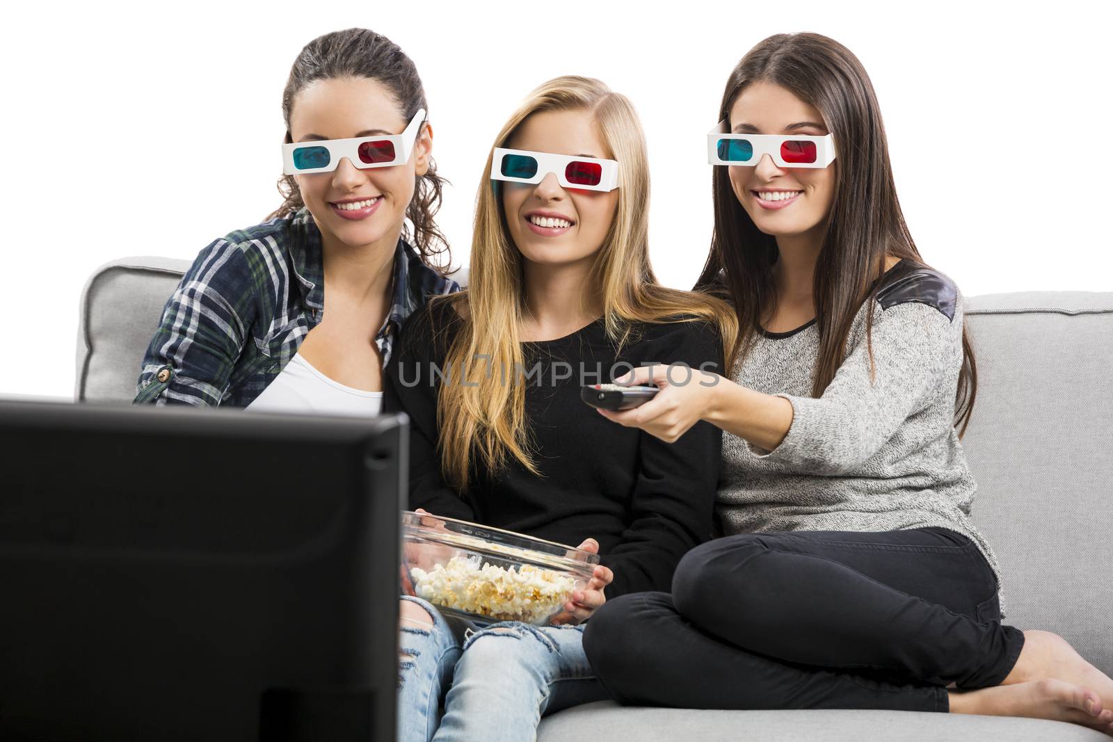 Girls watching 3D movies with popcorn