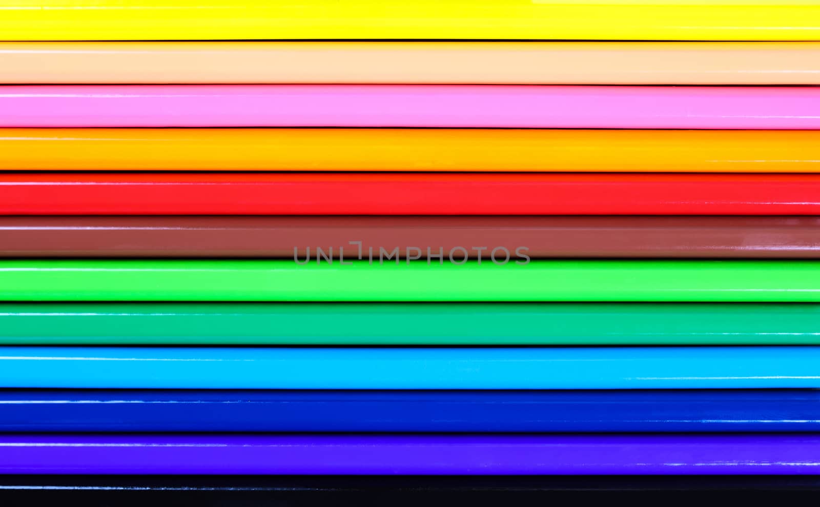 colored pencils close-up while lying in a row