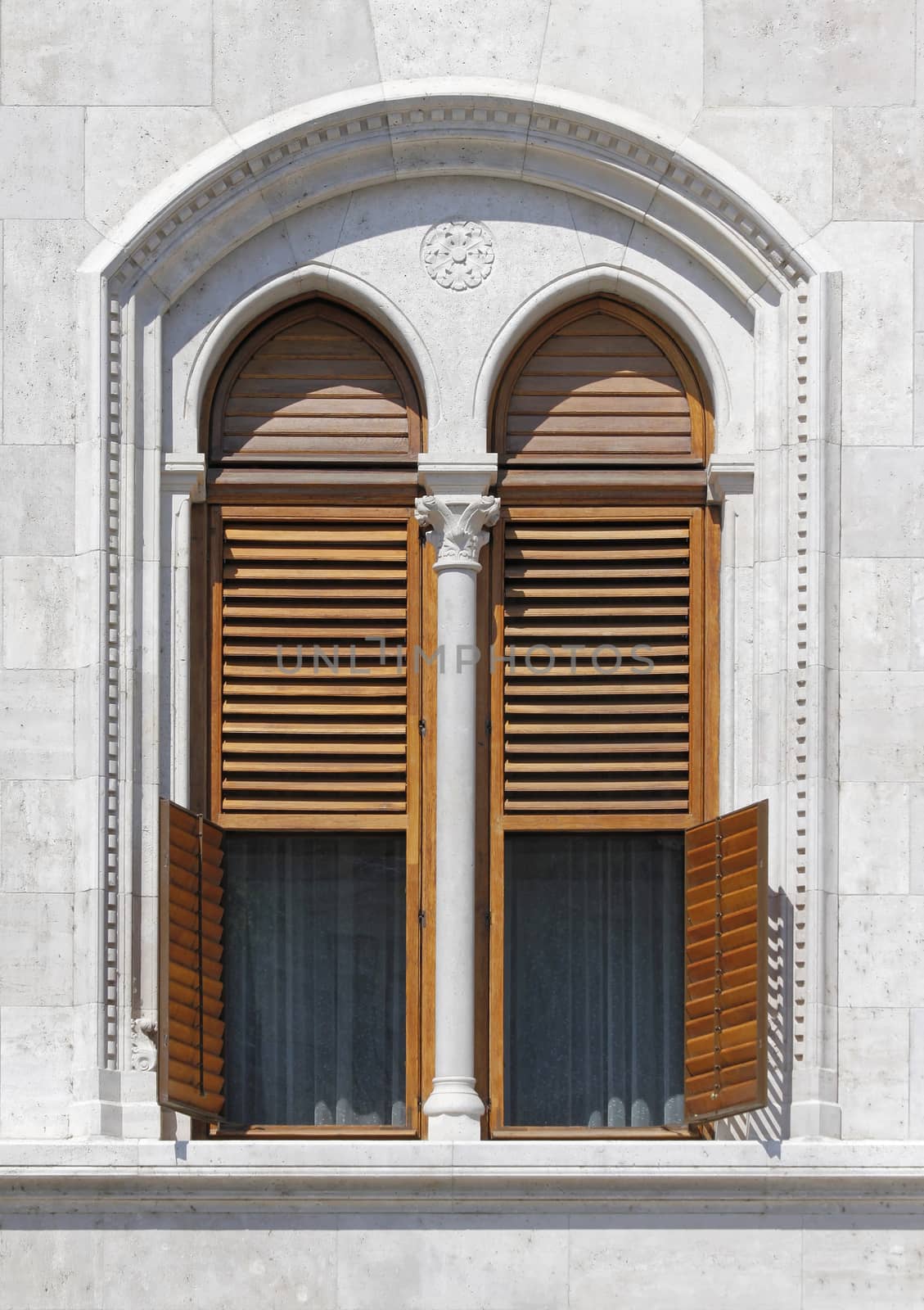 Gothic style windows with statues in Europe.
