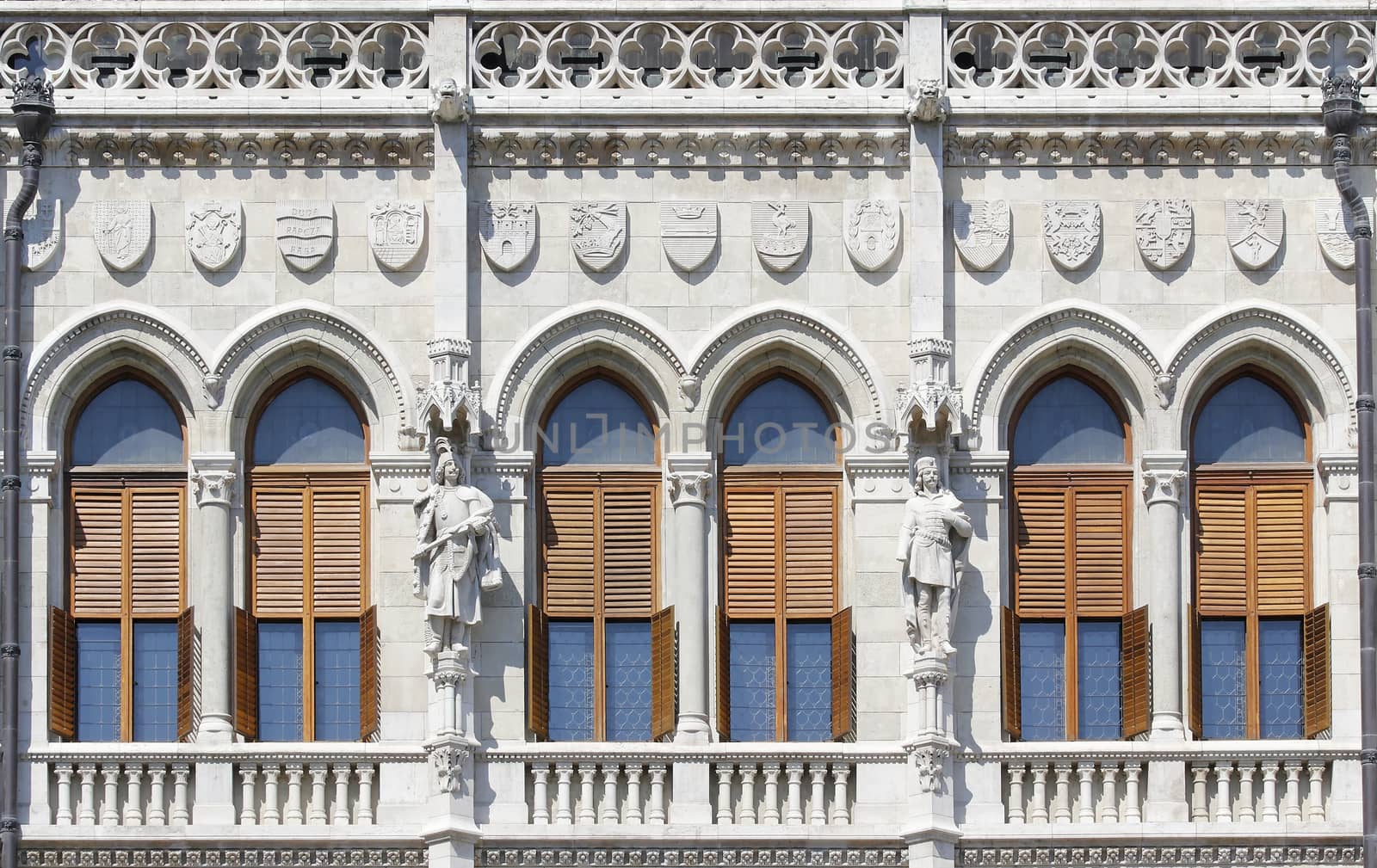 Gothic style windows with statues in Europe.