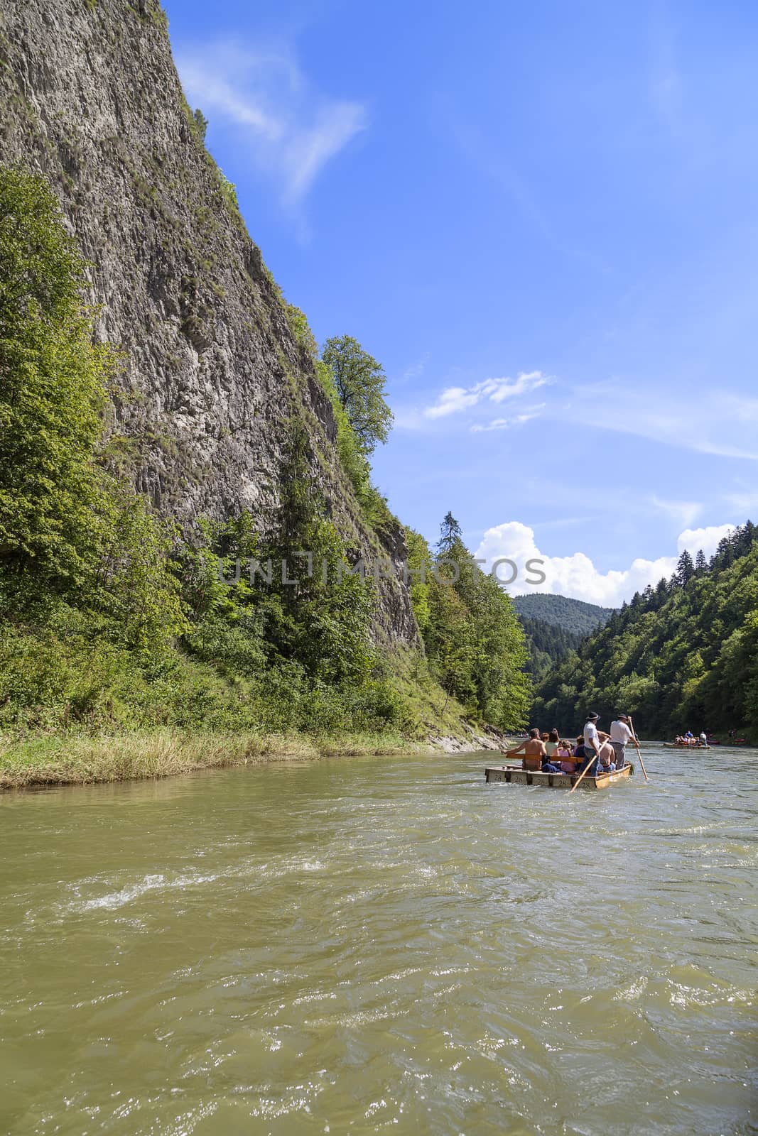 SZCZAWNICA, POLAND - AUGUST 14, 2016 : Dunajec River Gorge .view from boat rafting. 18-kilometer  route runs through the Pieniny Mountains to Szczawnica, National Park,  by river on the border between Poland and Slovakia.
