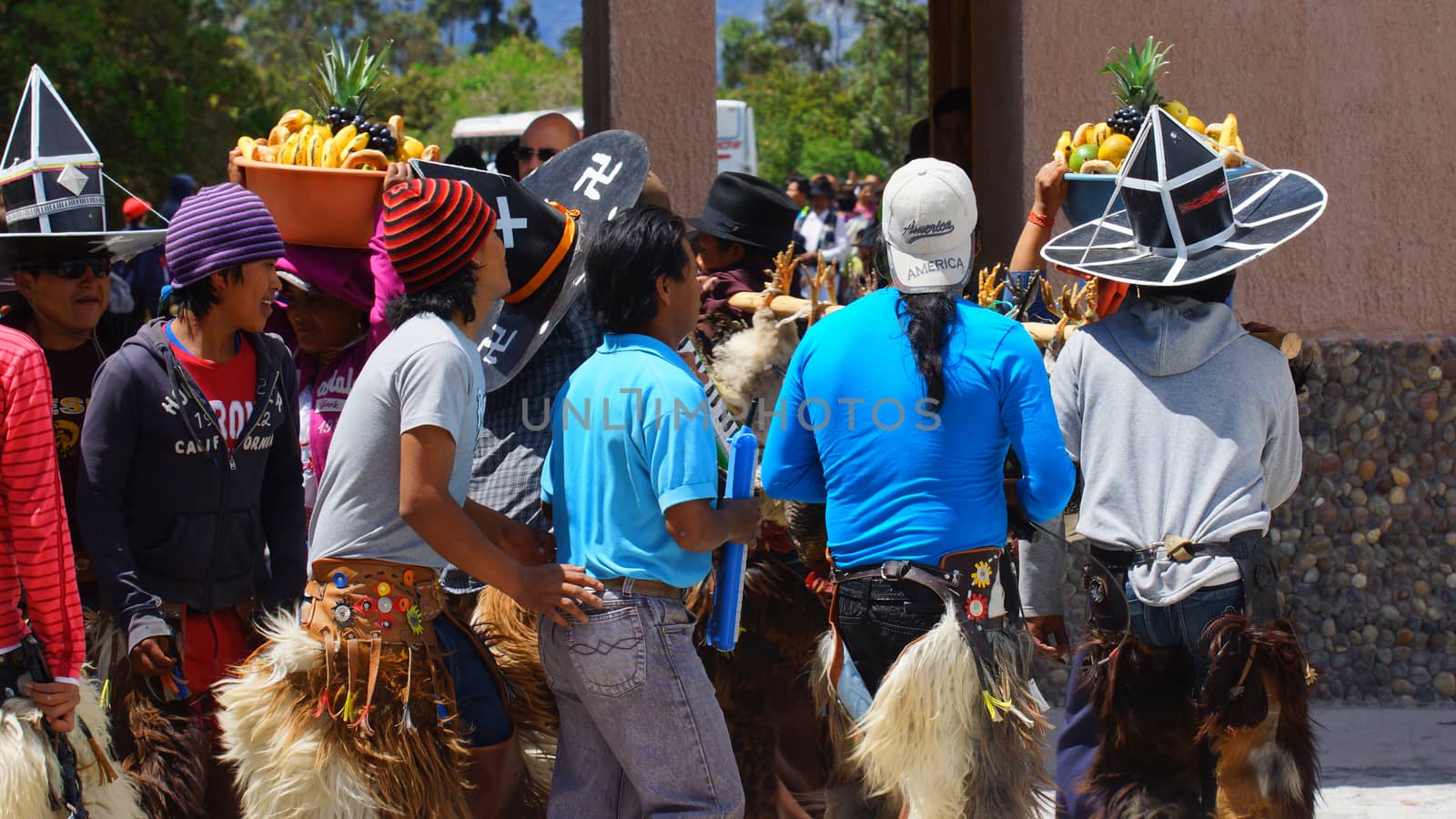 Cuicocha, Imbabura / Ecuador - June 22 2014: Indigenous group celebrating the solstice party near Cuicocha lagoon