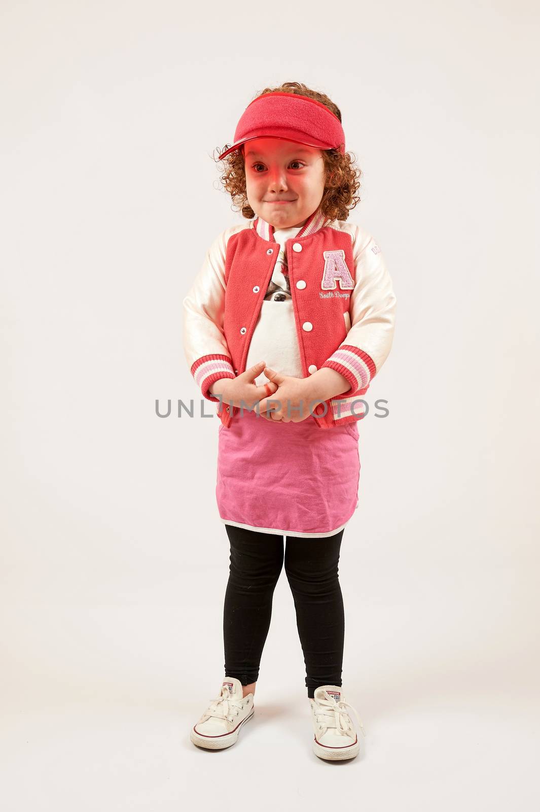 Little Girl Fashion Model With Red Cap by Multipedia