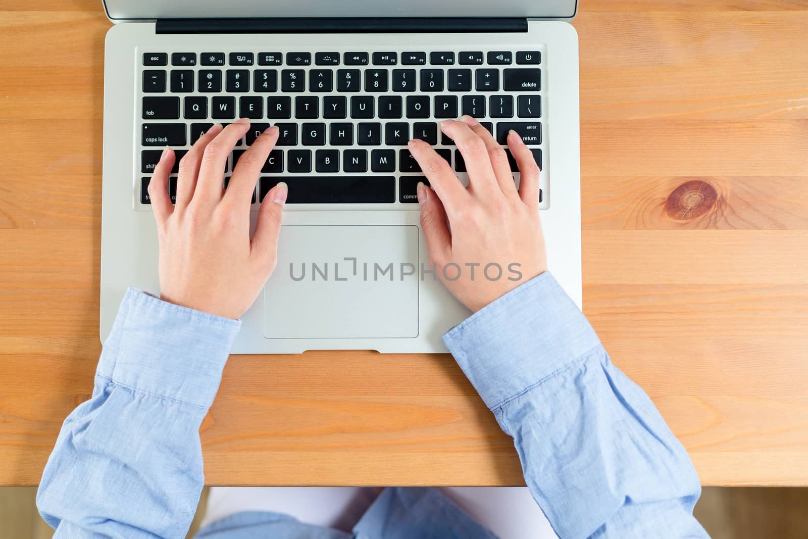 Woman use laptop by leungchopan