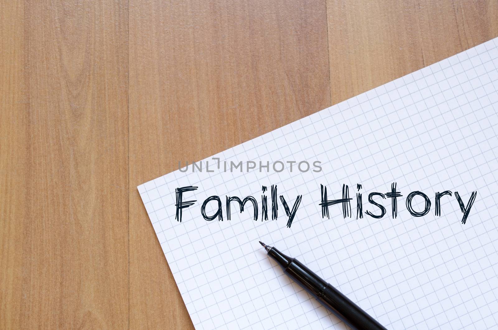 Family history text concept write on notebook with pen
