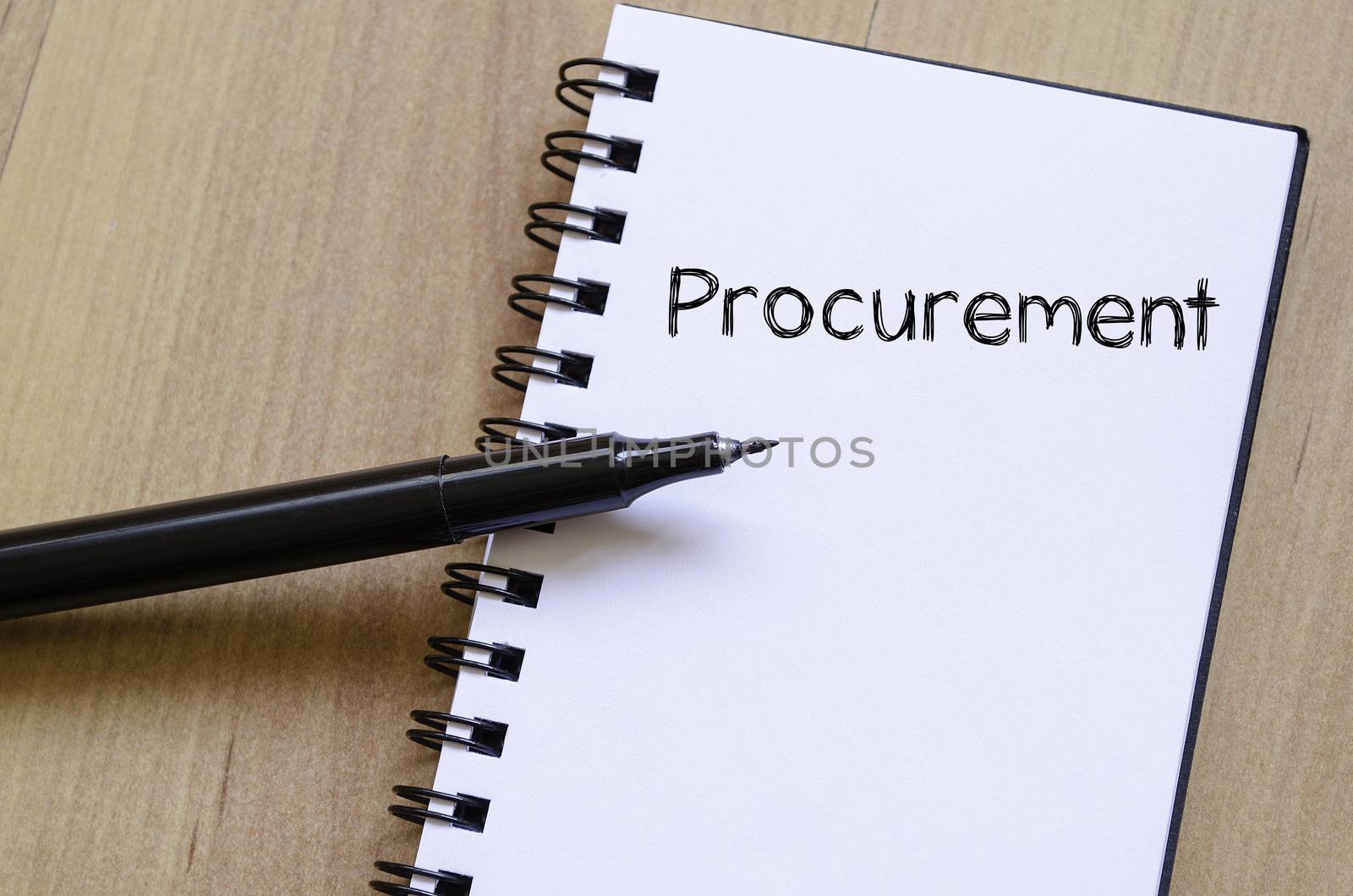Procurement text concept write on notebook with pen