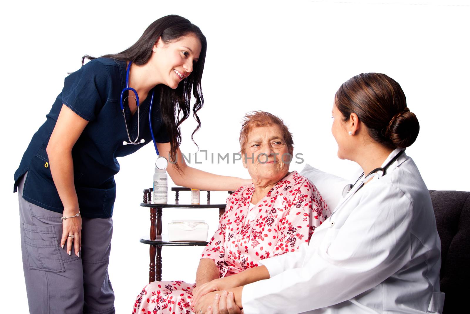 Doctor and Nurse consulting comforting Senior Patient at home health.