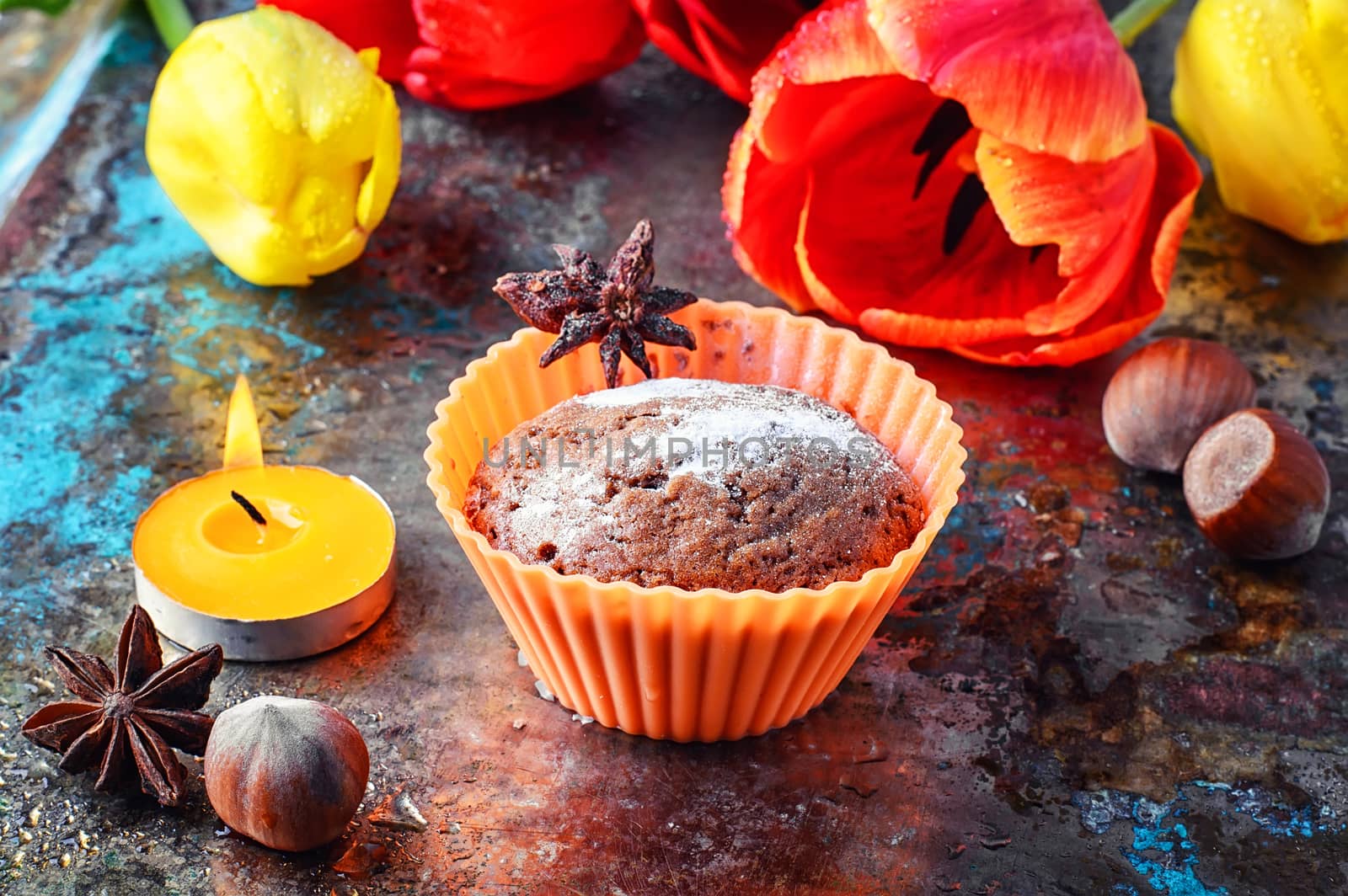 Baked chocolate cupcakes in the shape and bouquet of tulips