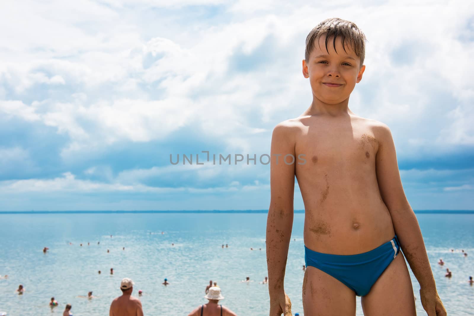 Baby boy at beach by rusak