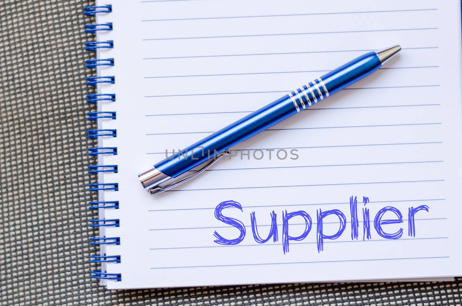 Supplier text concept write on notebook with pen