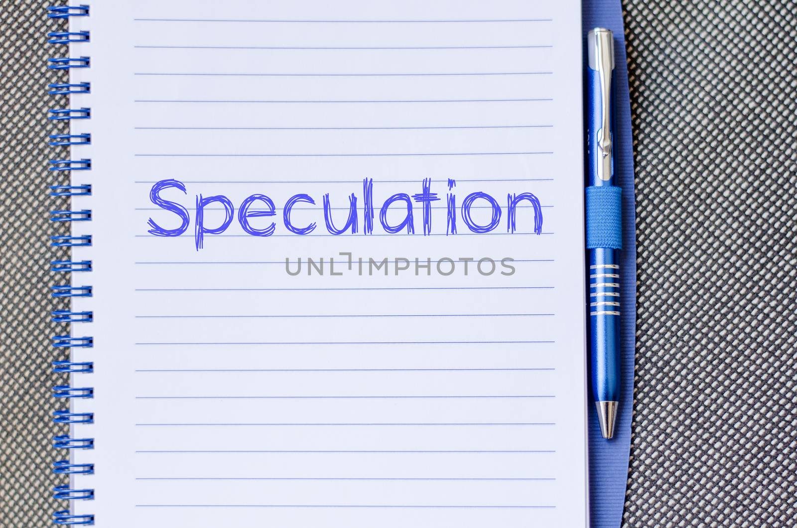 Speculation text concept write on notebook with pen