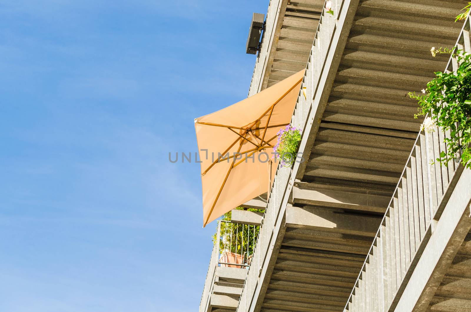 Sunshade on a terrace, view from below.