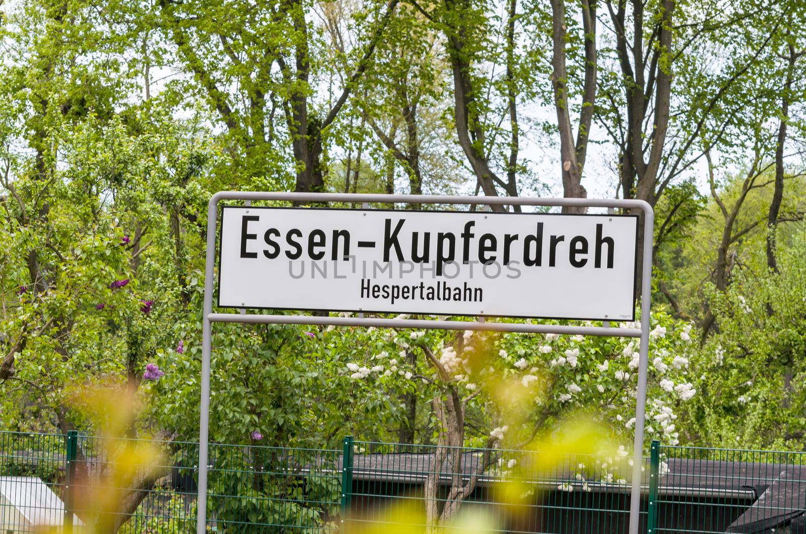Information Sign on a German station platform with the name of the station. In this picture the Kupferdreh train station in Essen, Germany.