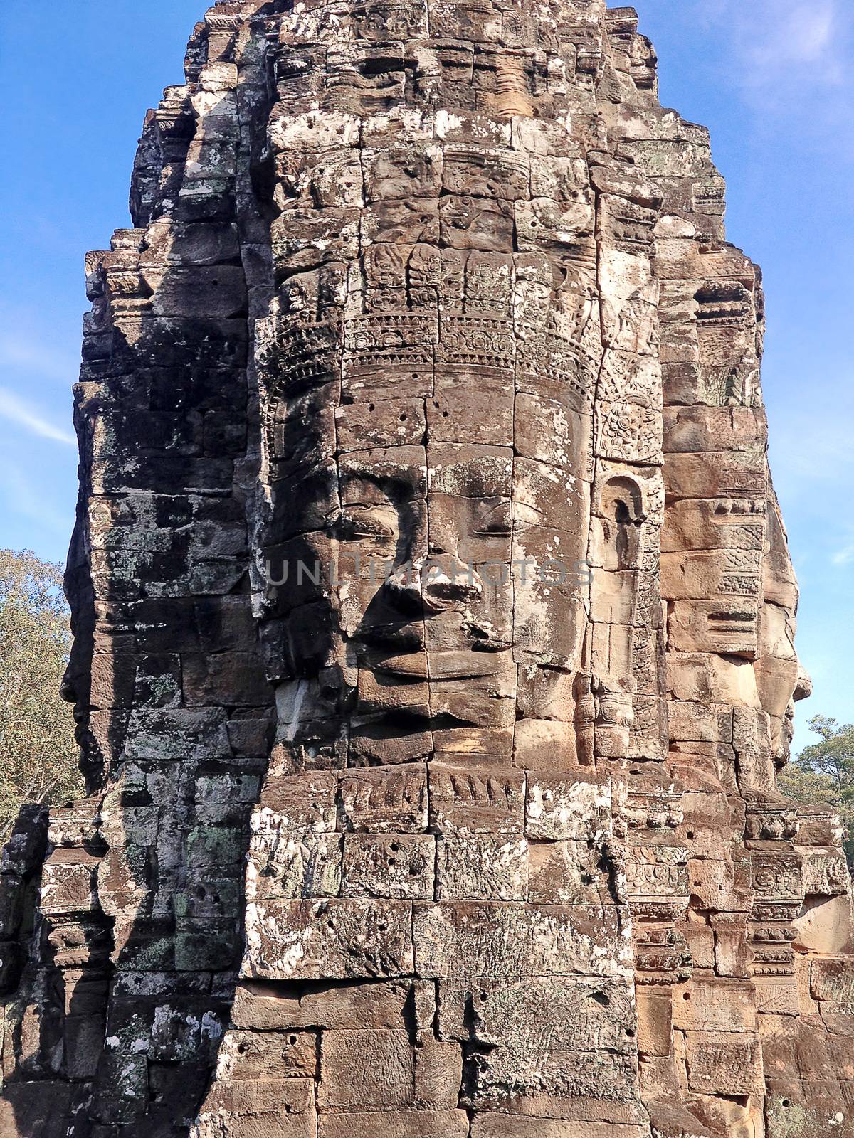 statue Bayon Temple Angkor Thom, Cambodia. Ancient Khmer architecture.