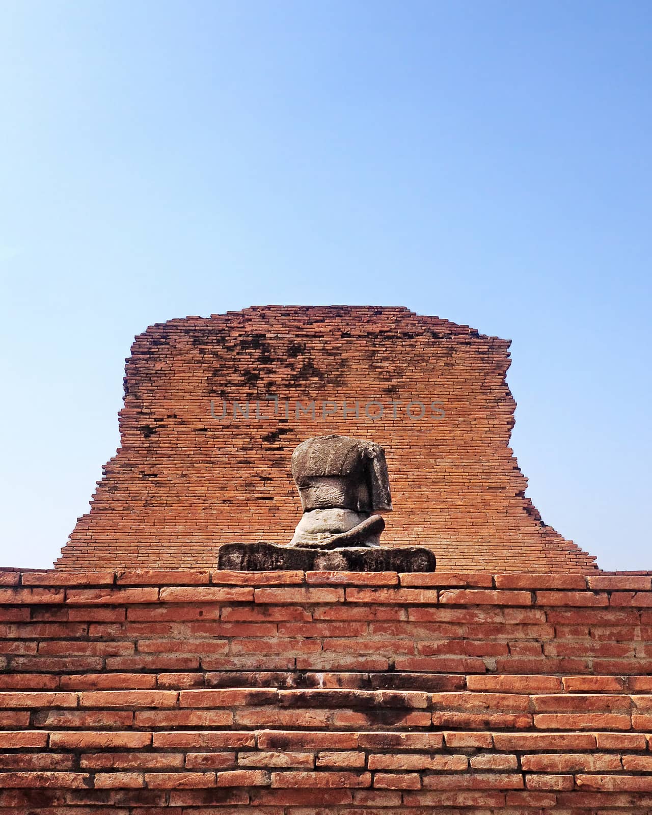 Ruin of Buddha statue in Ayutthaya historical park, Thailand