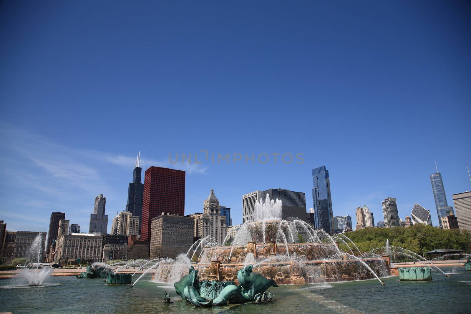 View of Chicago skyscrapers from famous Buckingham Fountain in Grant Park.