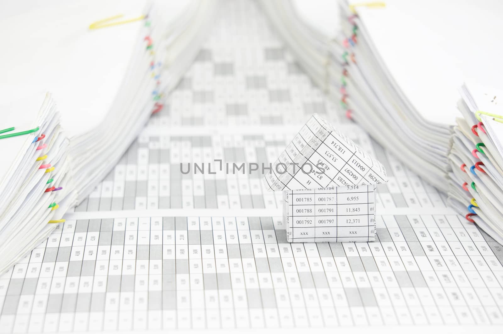 House have pile of document with colorful paperclip by eaglesky