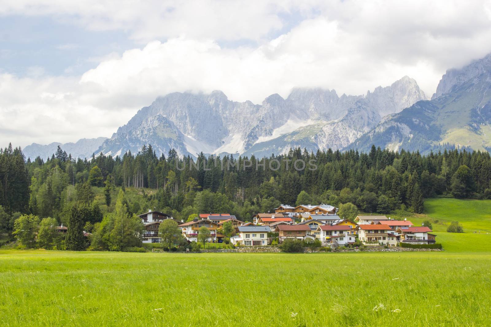 a beautiful view of the austrian alps and Oberndorf in Tirol, Austria