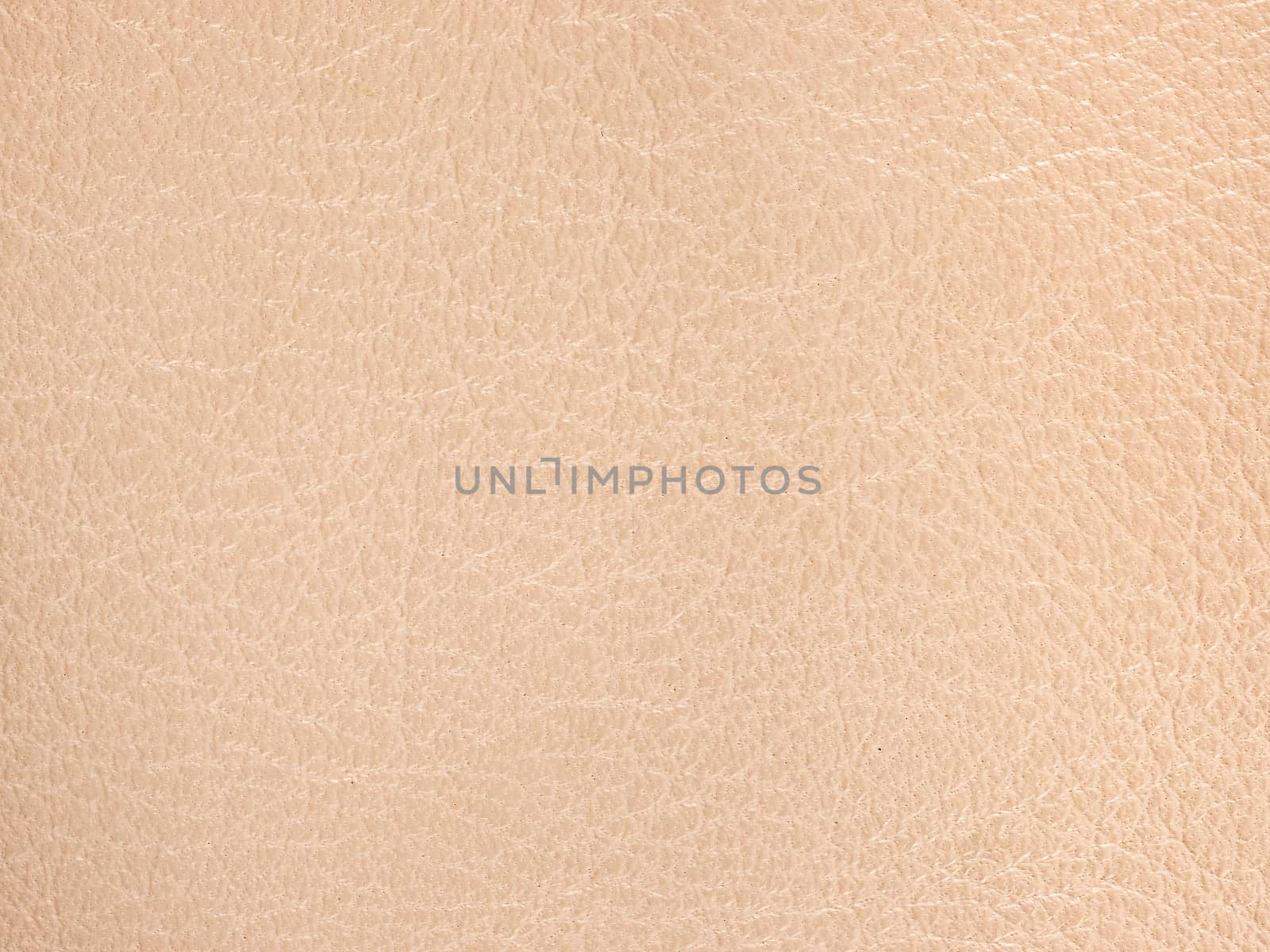 Closeup of beige leather texture as background