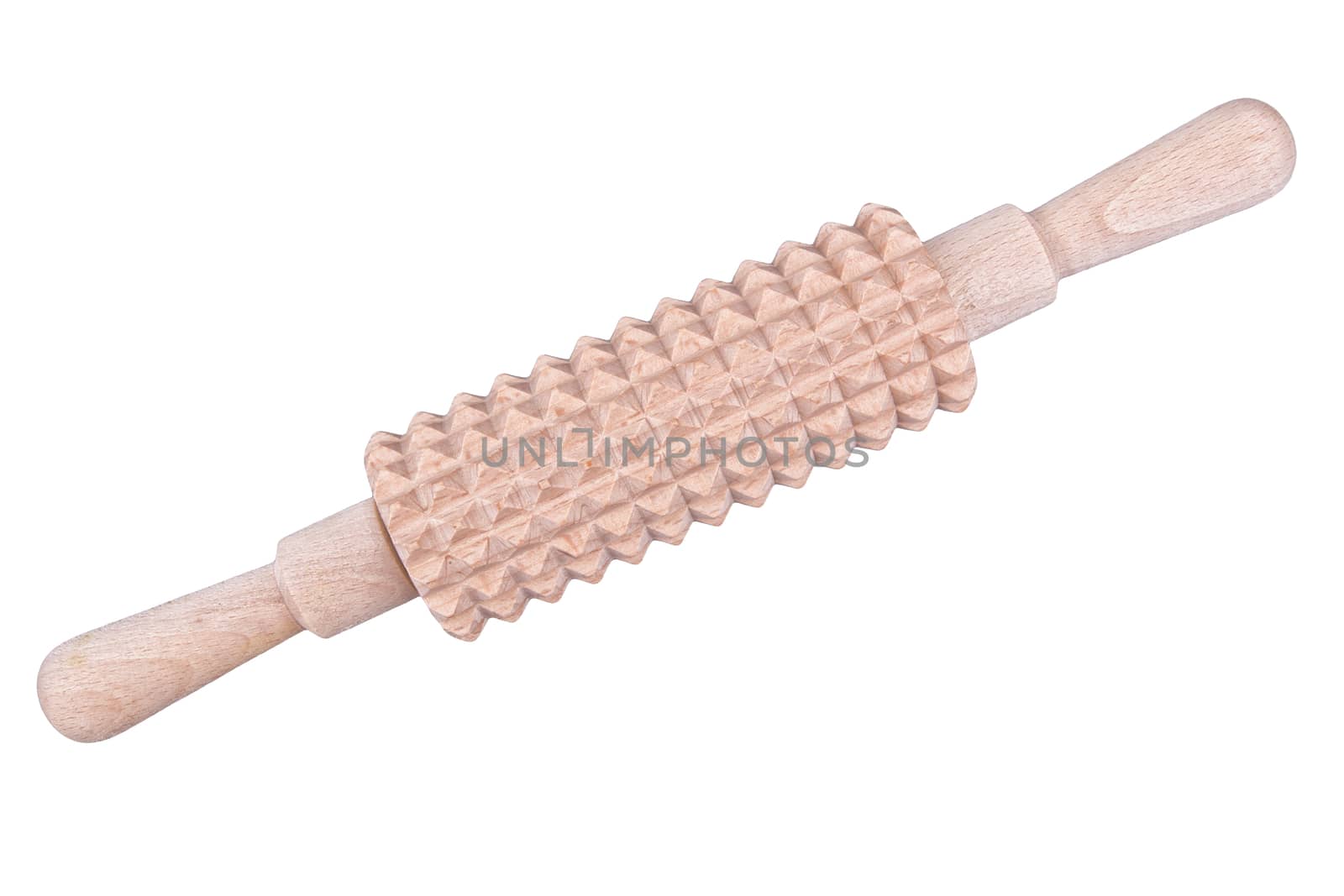 Wooden rolling pin on the dough isolated on a white background