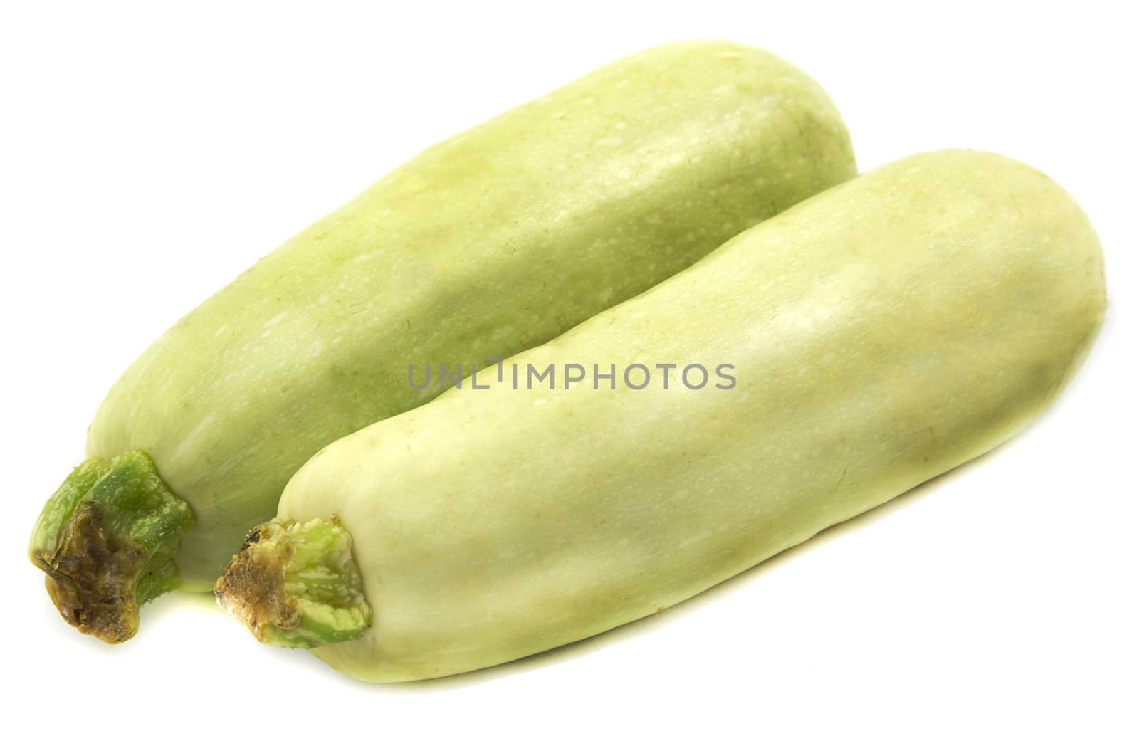 Two ripe bright large Zucchini, isolated on white background.