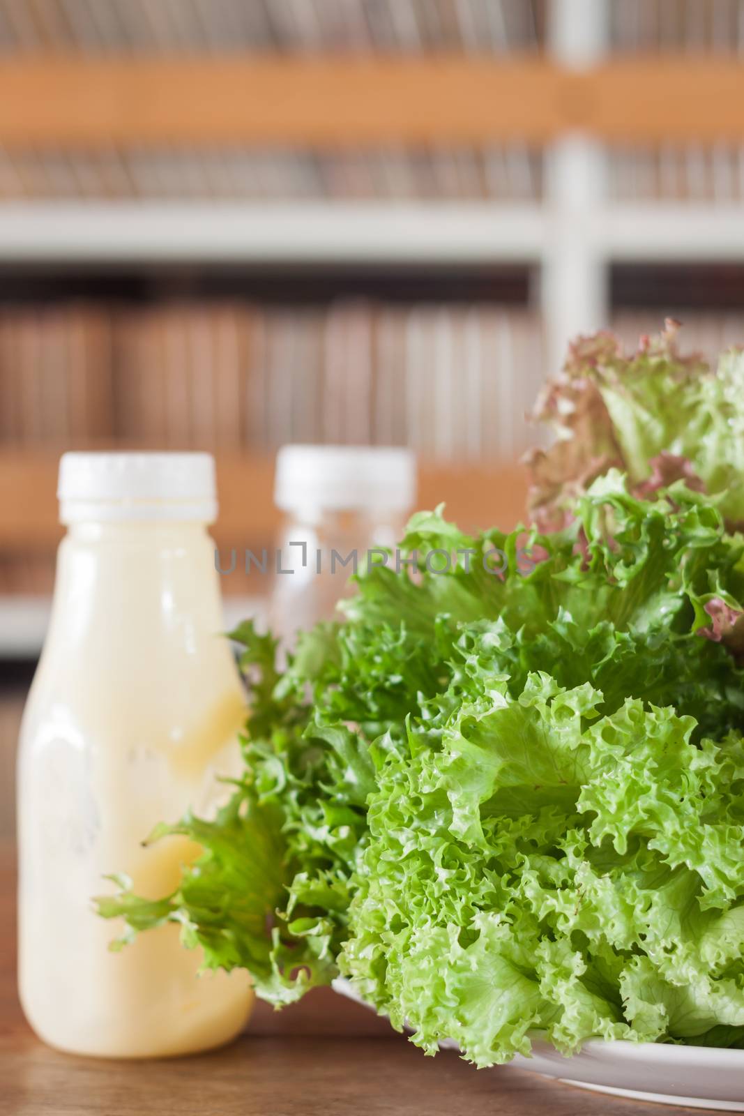 Fresh hydroponic vegetables on wooden table, stock photo