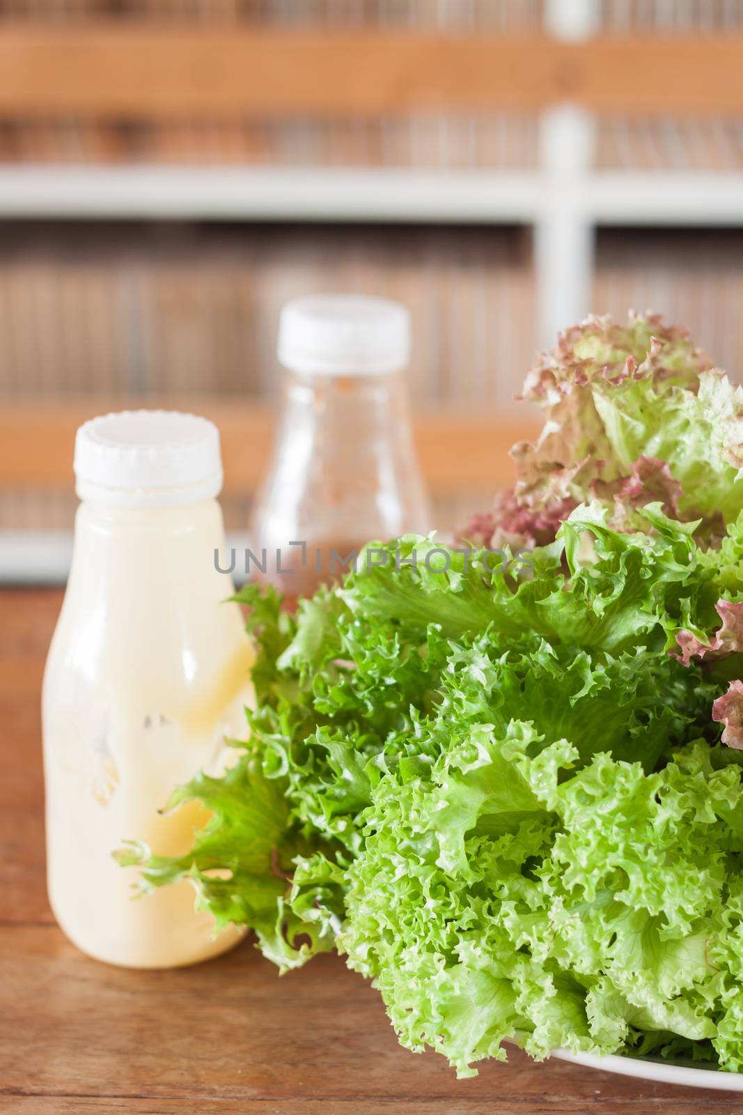 Fresh hydroponic vegetables on wooden table, stock photo