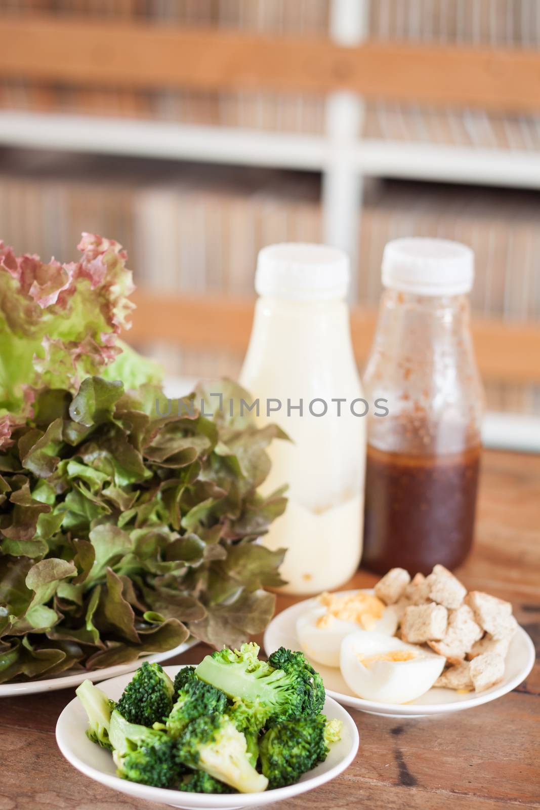 Fresh hydroponic vegetables on wooden table, stock photo