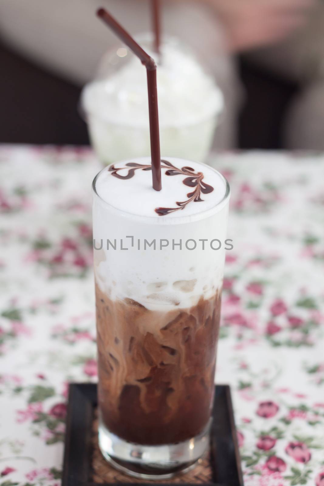 Iced mocha with milk micro foam, stock photo