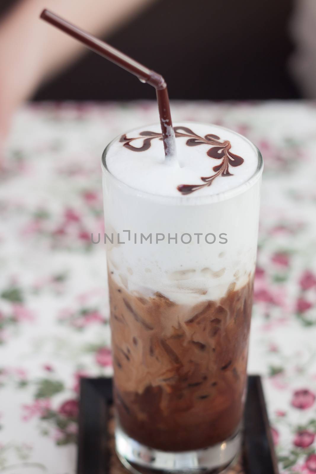 Iced mocha with milk micro foam, stock photo