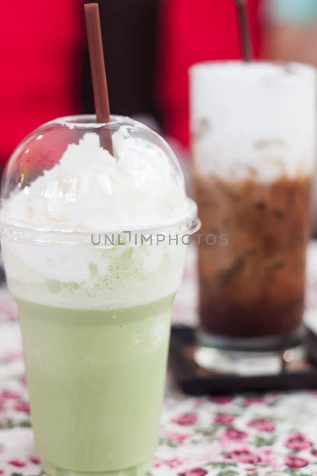 Macha green tea with whipped cream by punsayaporn