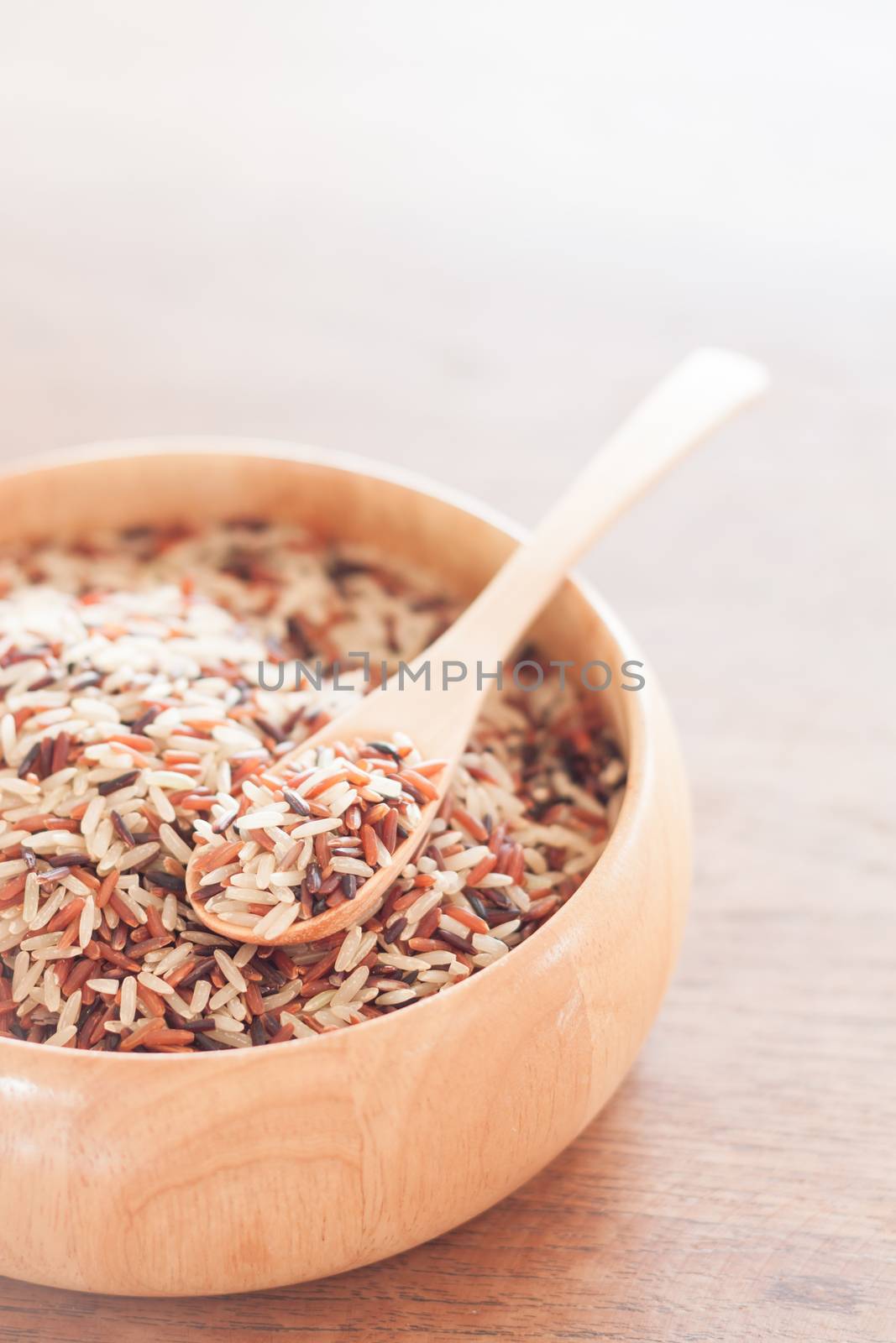 Organic Dry Multi Grain Rice in wooden bowl by punsayaporn