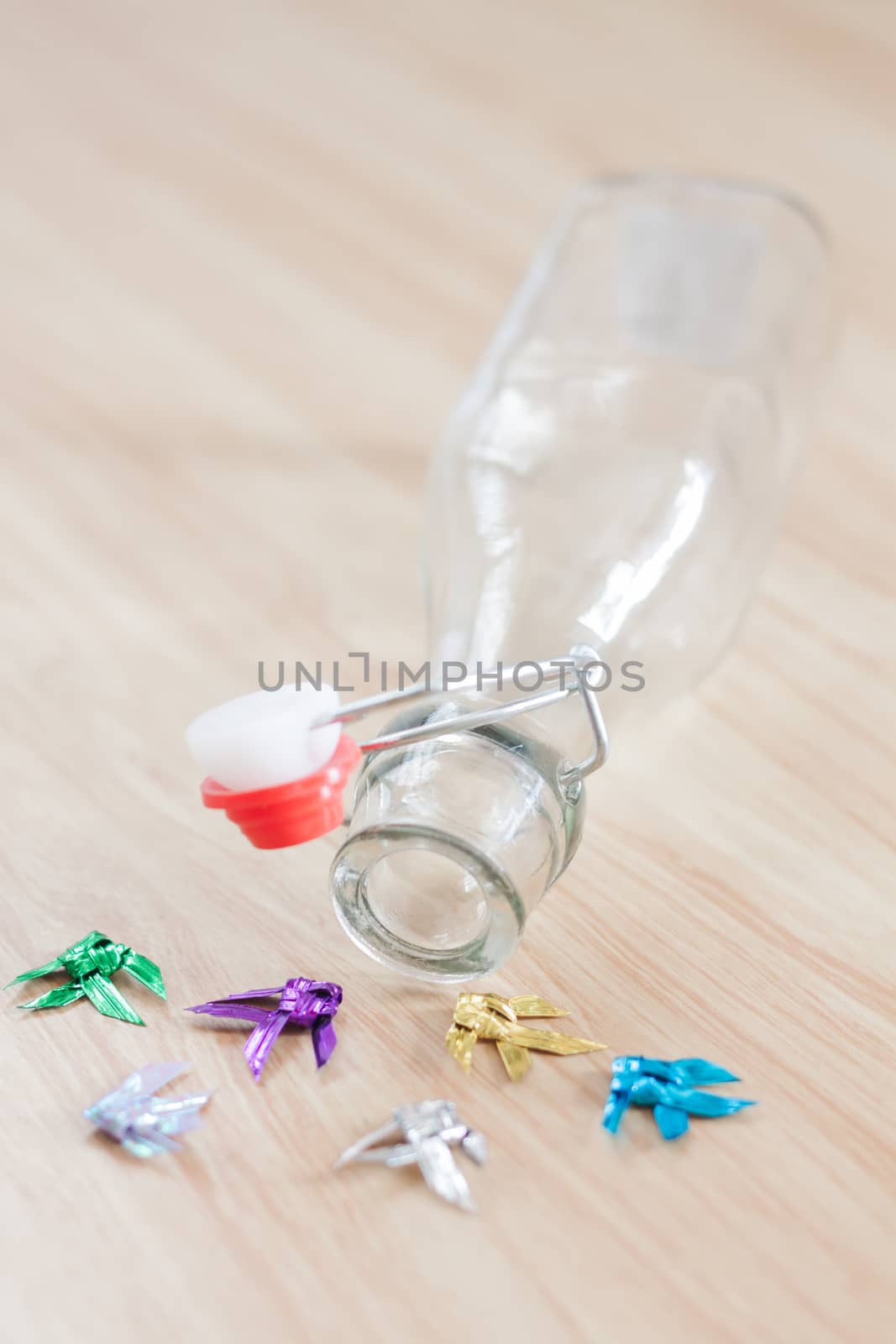 Vintage water bottle on wooden background by punsayaporn