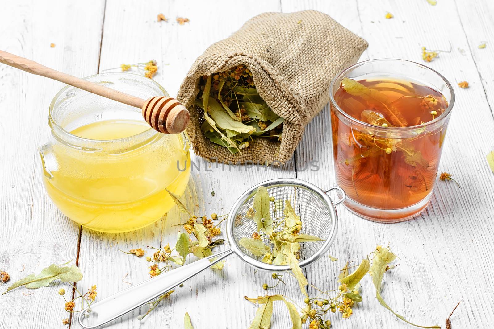 Glass mug with medicinal flower linden tea