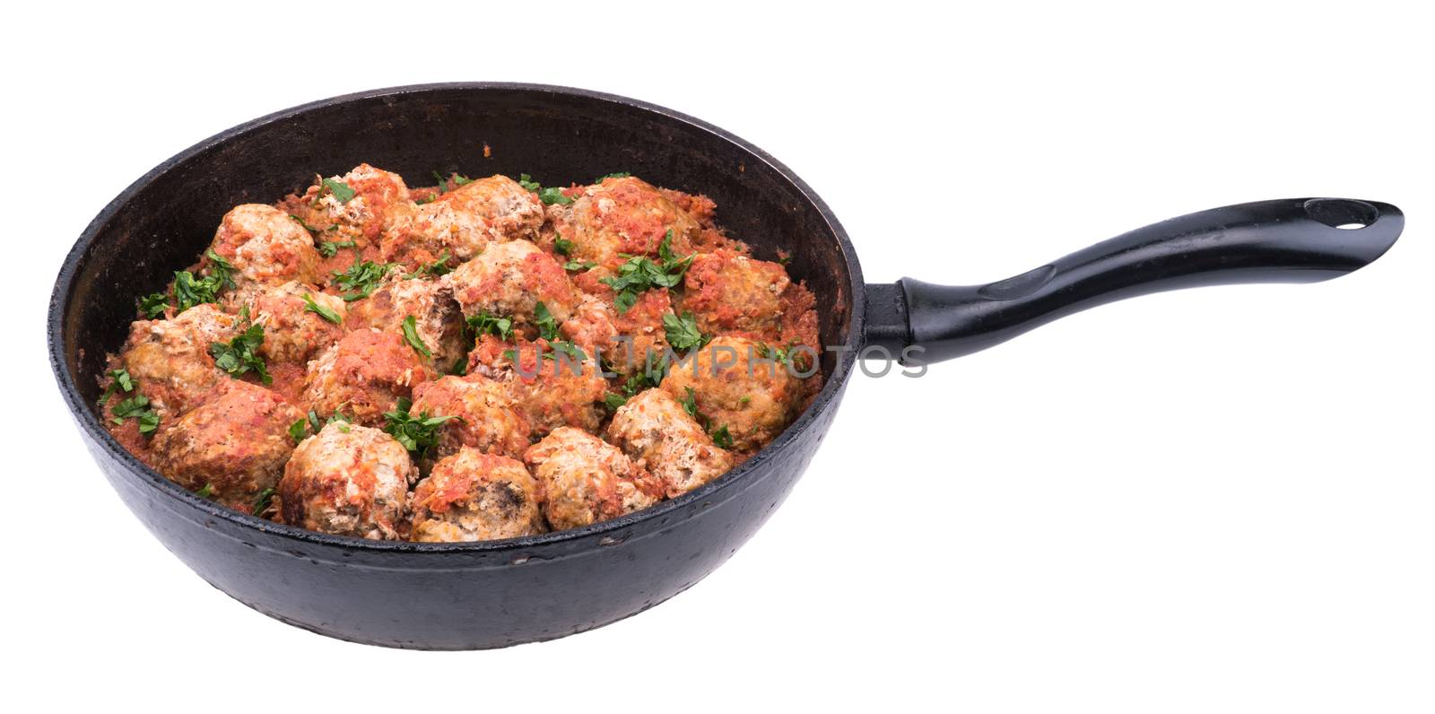 Stewed meatballs in a pan isolated on white background. Selective focus.